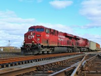 The past, the future and the present all in one photo. The old main line and "X" to 'Ham One', a future piece in the process of being constructed, and the present line with daily CP 246 led by CP 8865 and CP 8910 headed for Desjardins. 