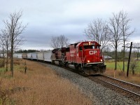 It was a good day for being a rail fan with two trains going by in forty-five minutes with a pair of EX-SOO, SD60's leading. CP 147 had CP 6223 leading and here is CP 240 led by CP 6254 on its way to Guelph Junction. What a contrast in paint to the dirty CP 8604 trailing!