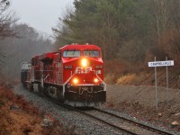 Well, the Hamilton sub entrance and exit to Guelph Junction has been named or called "CTC Campbellville" as of November 17th by the RTC. According to foreman I spoke with, there was too many Guelph Junctions to keep track of so the name change is to avoid or lessen the confusion. 
Here, on a mild, rainy day, a nicely refurbished CP 8639 leads CP 8735 past the newly installed Campbellville name sign on its way south to Desjardins.