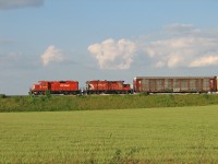 Going through my older pictures lately. Here we have CP GP9u 8234 paired with 1618 switching CAMI in Ingersoll on a nice June evening back in 2006. 