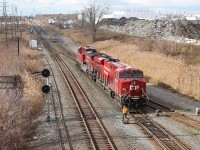 CP 141 does its switching work on the west end of Walkerville Yard at Walkerville Junction. Walkerville Junction is where CN crosses CP to get to the Pelton Spur from the Chrysler Spur and vice versa. The far right track is the Chrysler Spur and subsequent yard lead into CN's Little Yard which parallels Walkerville Yard. 