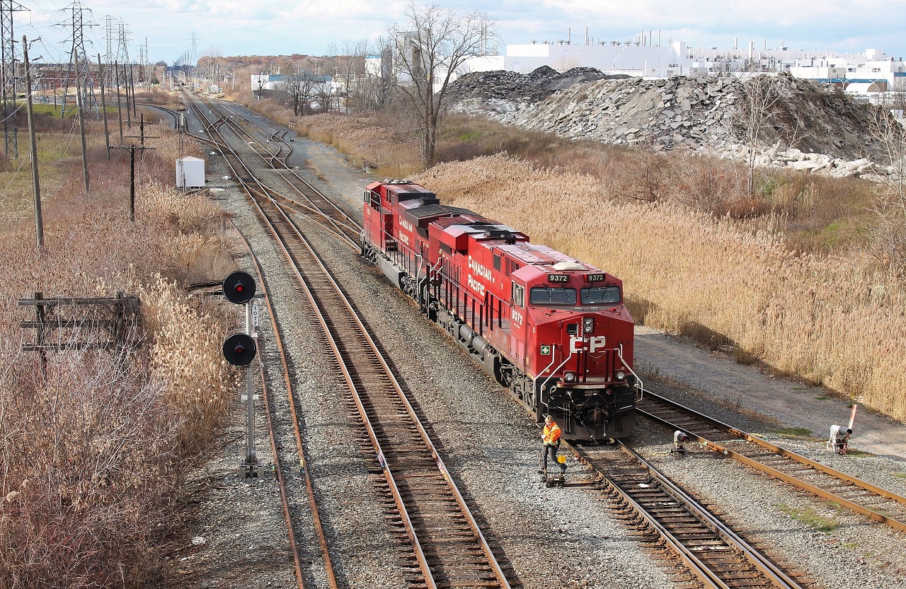 CP 141 does its switching work on the west end of Walkerville Yard at Walkerville Junction. Walkerville Junction is where CN crosses CP to get to the Pelton Spur from the Chrysler Spur and vice versa. The far right track is the Chrysler Spur and subsequent yard lead into CN's Little Yard which parallels Walkerville Yard.