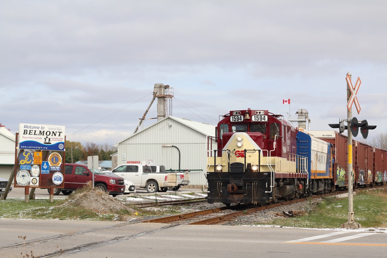 The feed mill at Belmont last saw rail service long before CP transferred the St. Thomas subdivision to the OSR. While the siding here was severed at the crossing years ago its ends still see occasional use for car storage when needed. This day a cut of LPG tank cars were being stored on the west end of the former siding. The tank cars on today's train are destined for the CN yard in St. Thomas while the short cut of NS boxcars will be dropped at an industry on the outskirts of St. Thomas.