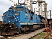 Ex LMS and Conrail C40-8W #726 passes through the Agincourt fuel stand patched for new owner Norfolk Southern as it's #8466. 