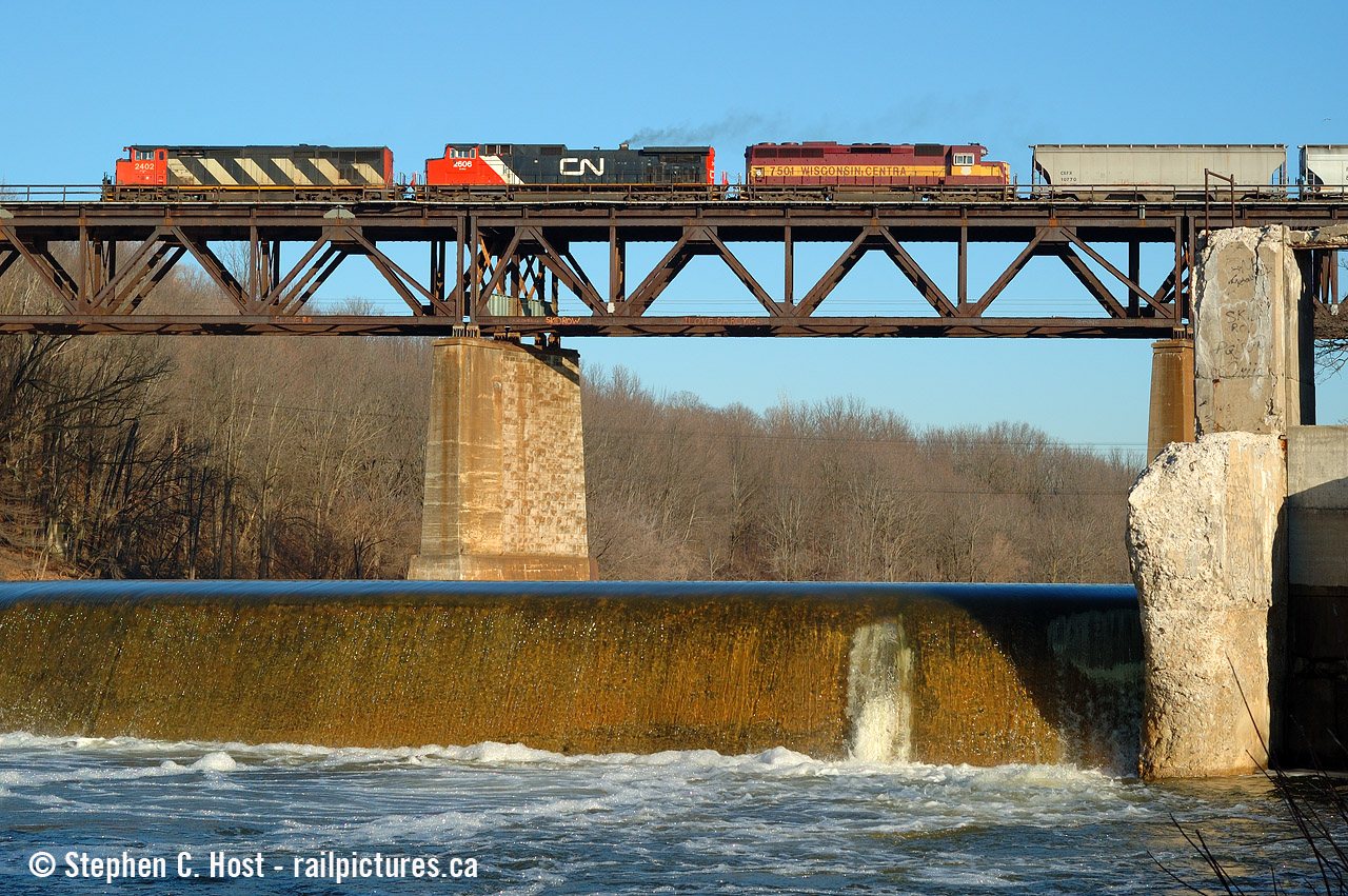A splash of colour passing by the ruins of some water powered mill, a popular prop for those shooting here. The SD45's were fairly common in trailing position before retirement.
