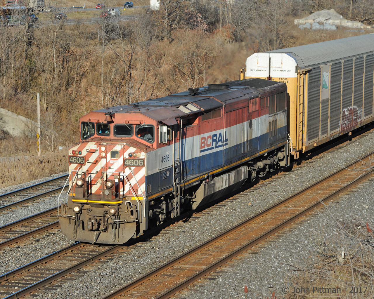 BCOL 4606 in the lead - an all BC Rail consist the easy way.  Westbound on the Oakville sub approaching MP 35.5.  When I've seen this all-autorack train recently, it has often been powered by a single CN unit.  The far track is the Aldershot Yard west-end lead that joins the main line at CN Snake (Road).  Before the third main track was added, the location where BCOL 4606 is pictured was named CN Aldershot West; former location of the signals and switches into the west end of Aldershot Yard.