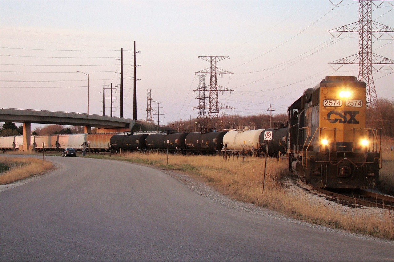 Here CSX 2574 pulls 8 tank cars into the large Suncor refinery located behind me, with the rest of his train sitting on the main. The sun is setting on a long day of chasing the local to Tupperville and various switch jobs around Sarnia, the time being 19:30, this job would still be working down in Lasalle Yard by the time we left at 22:15.