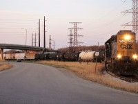 Here CSX 2574 pulls 8 tank cars into the large Suncor refinery located behind me, with the rest of his train sitting on the main. The sun is setting on a long day of chasing the local to Tupperville and various switch jobs around Sarnia, the time being 19:30, this job would still be working down in Lasalle Yard by the time we left at 22:15.