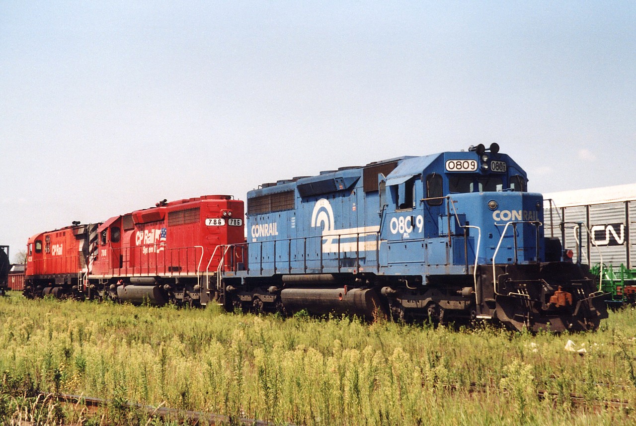 In the mid-nineties CP was very power shot and leased SD40 and SD40-2s from several sources.  Conrail saw an opportunity in the same time frame and created Conrail Leasing.  Several Conrail SD40s were repainted solid Conrail-blue and lettered "CRL" 600s.  This lasted unit someone realised "CRL" was the reporting mark for Chicago Railink and they were relettered to simply "CR".  There were also SD40s that Conrail renumbered in to the 800s for the lease fleet; other than the renumbering they retained their full Conrail dress.  For some reason unknown to me CR 809 was renumbered with an addition "O".  It is seen laying over in Aberdeen Yard with CP 786 and CP 4226.  Conrail also purchased ex. ATSF C30-7s via GE for the lease fleet.  The C30-7s were also painted solid Conrail-blue and numbered in the 500s, however they were not leased to CP.
