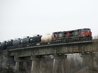 2535 and 2642 lead a westbound over the Humber River.
