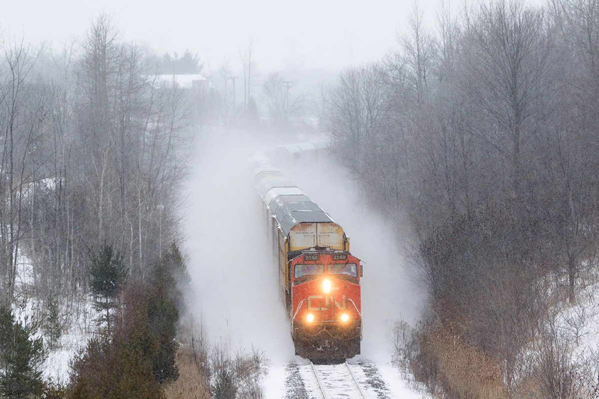 Solo on CN 371, 2588 dashes through the snow on a snowy and cold Saturday afternoon in Milton.