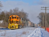 GEXR 431 kicks up some snow as it scoots out of Guelph with a short train for Stratford during a very chilly afternoon.  Here's to a Happy New Year to all fellow railfans!