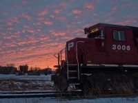 CP 3006 watches a wintery sunset unfold in the branch-line town of Kerrobert Saskatchewan.  