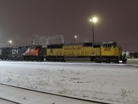 Dispatch crew driving a UP SD70M picks up dead CN 2502 to be transferred to the CN/CP interchange.