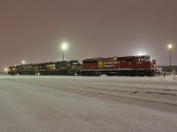 At least there was a nice quartet of power to shoot on this blustery snowy day. Here at 6am on the shop's west end was a consist waiting to go out with CP SD60M 6261 NS 9082 BNSF 747 and CEFX 1033.