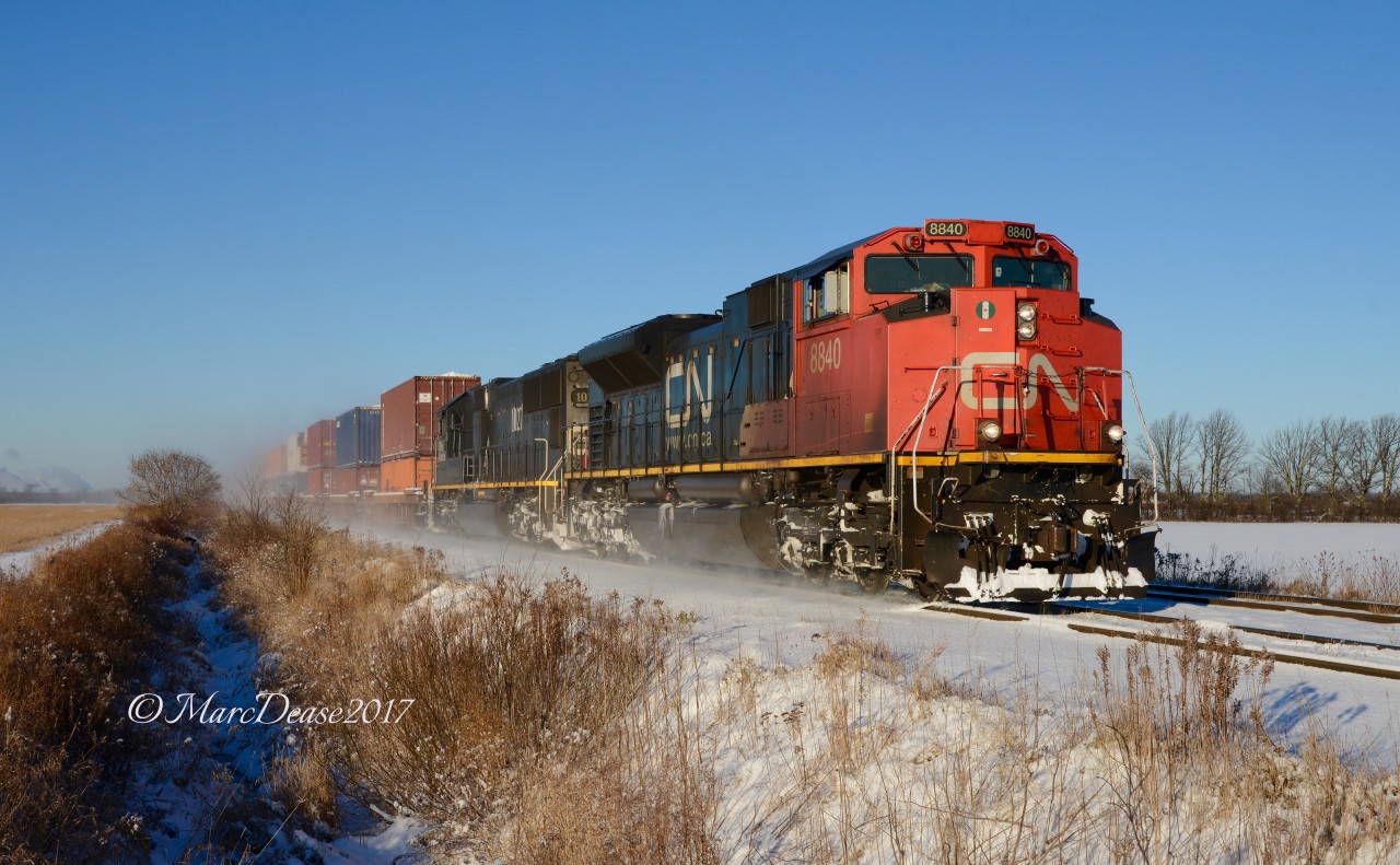 CN 8840 with IC 1027 head east out of Sarnia at Waterworks Sideroad.