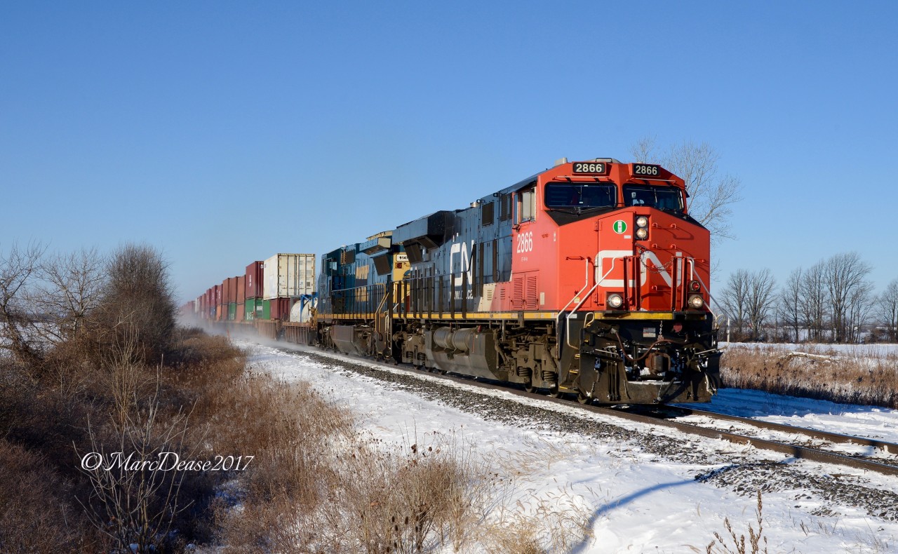 Today's 148 train wasted no time in Sarnia departing 25 minutes after arrival. I had caught it earlier and knew  it had former CSX unit 7236 patched as GECX 9147. Normally I can make it to Waterworks Sideroad but today they were flying on departure so my best chance would be Camlachie Sideroad which I made with about 30 seconds to spare.