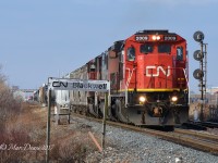 CN 2009 leading train 394 knocks down the light at Blackwell on its way out of Sarnia.