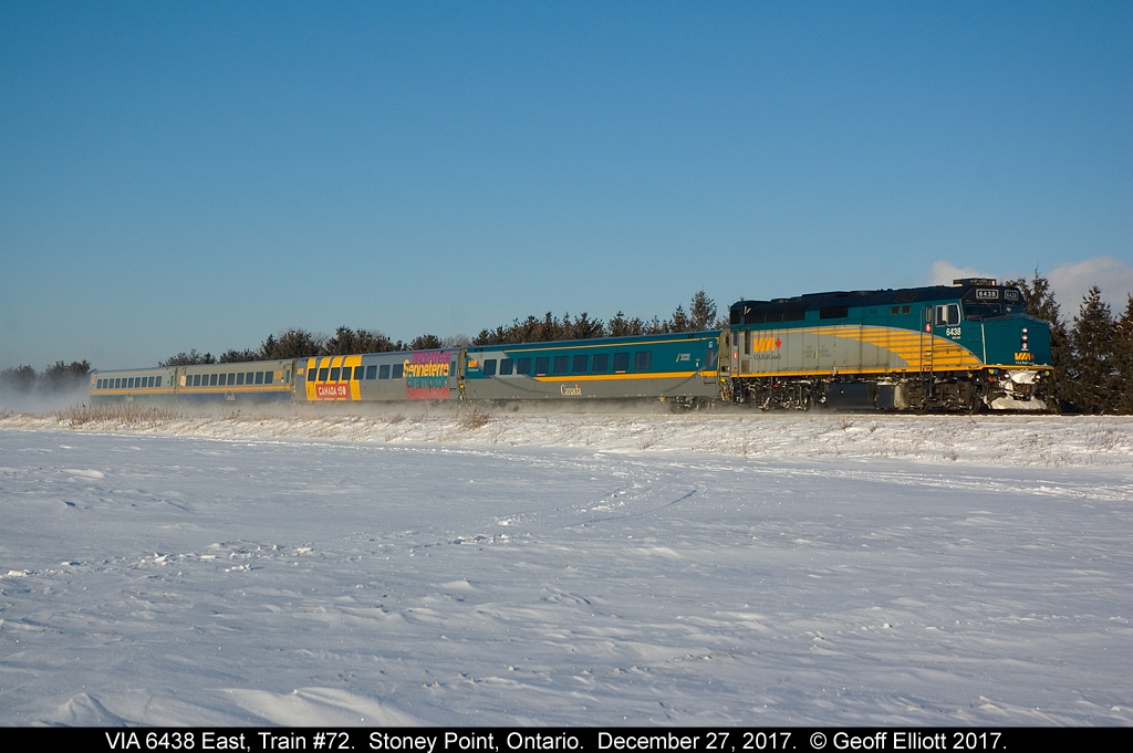 VIA 6438 kicks up a little snow as it speeds through the Stoney Point area with train #72 on a beautiful sunny December 27, 2017.  With a windchill of -26, it was still worth getting out and shooting on a beautiful morning like this even though I had hoped for a Canada 150 to be on the point.