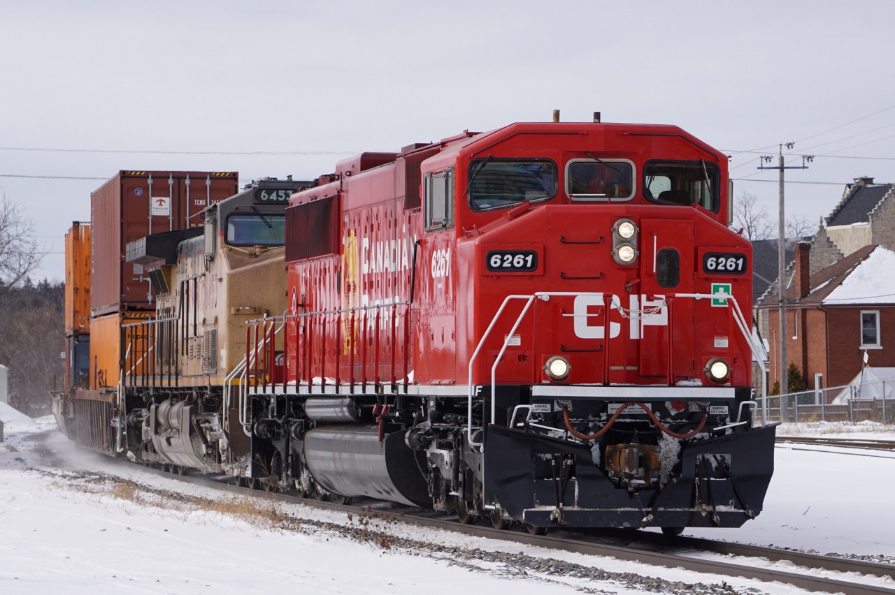 A fresh rebuild leads 2-244 into Galt for a lift, later dropping the cars off at Guelph Junction.