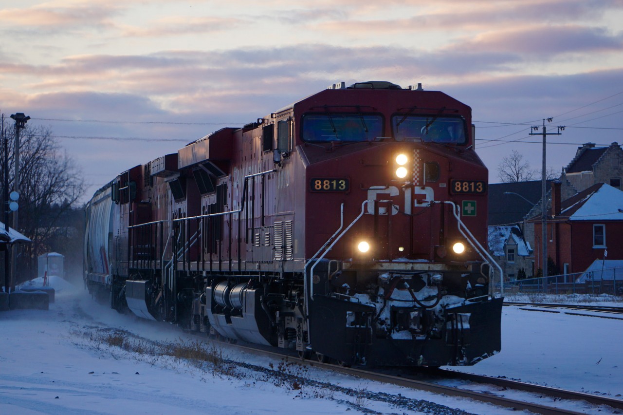 The sun is slowly setting as 8813 flies past Galt.