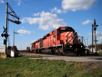 Out for a bike ride this lovely autumn afternoon (with camera of course) and I came across this mixed freight leaving Windsor Yard. Driving by the very next day and these old-school crossing gates had come down with new ones being installed, saddened to see, but happy I got this pic of what was then basic power. Both units - 5962 and 5749 - were commonly assigned to Windsor.