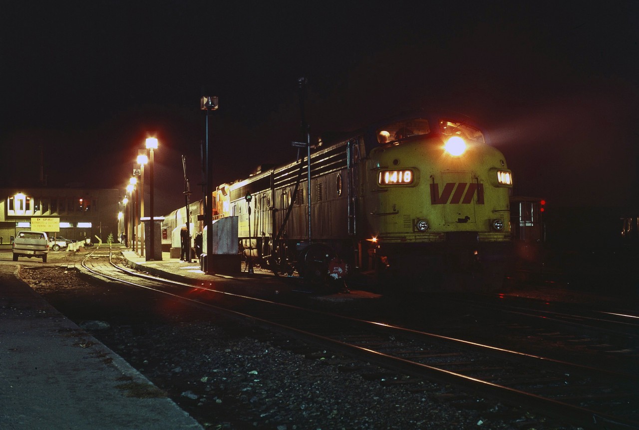There has always been something about the " Canadian " that catches my attention. The night of October 13, 1981 was no exception.

While working as a trainman for CP in Revelstoke, the camera was easy to throw in the grip, but not a tripod. As I walked to the crew bus for a ride to the head-end of our eastbound coal train, whose caboose can be seen just to the right of the 1410, I turned briefly, liked what I saw and decided to try the shot.  Hand held, Kodachrome 64 pushed to the limit, and only so much available light. Oh for the digital days.

I was pleased with the result.  The hogger taking a last look at the orders, the watering and fueling of the units complete, and the headlight just turned to bright.  Seconds later, No.1 would be westbound on the Shuswap Sub. and I would be rolling east to Golden.