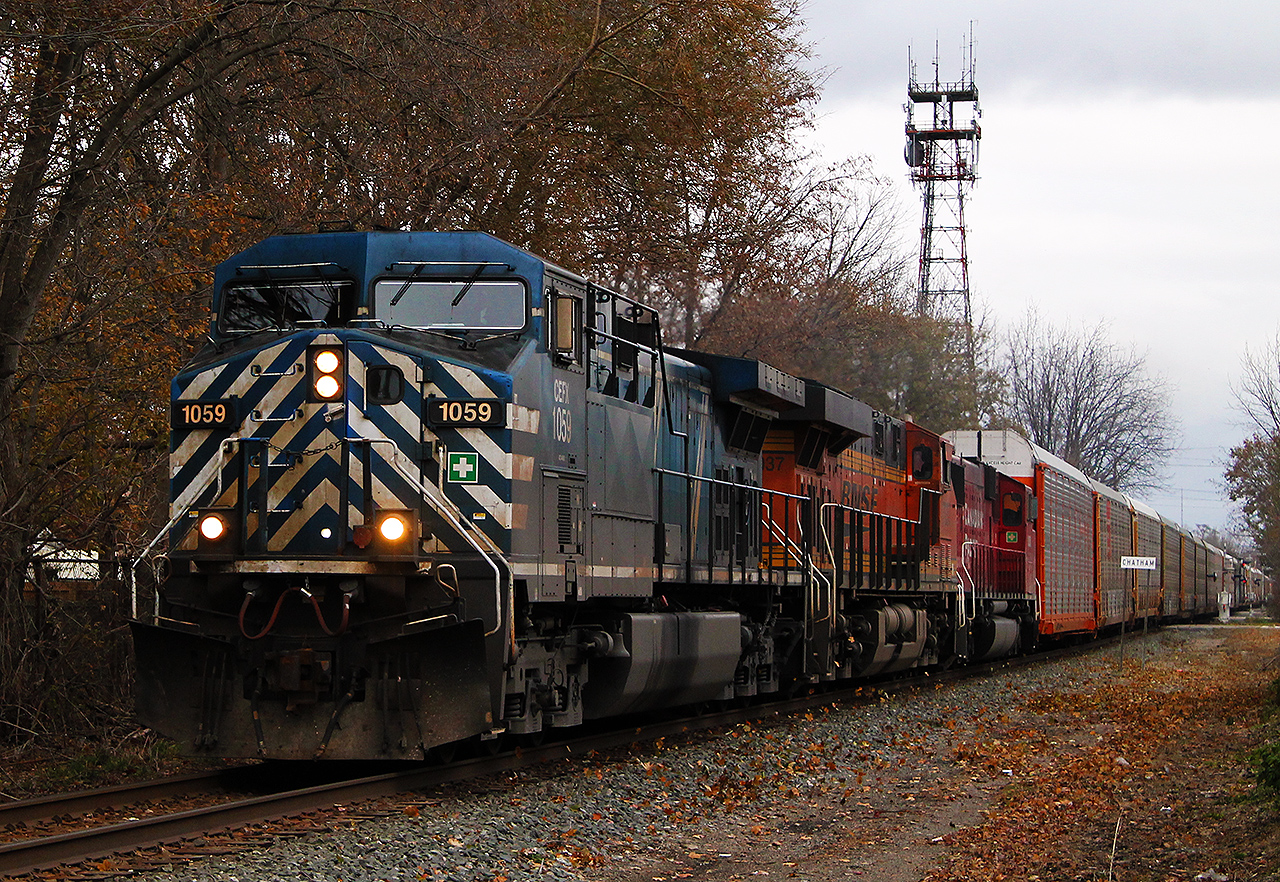 A very dreary fall day finds CEFX 1059 leading this westbound CP freight through Chatham with a colourful consist. The consist includes BNSF 7037 and ex-SOO CP 6258.