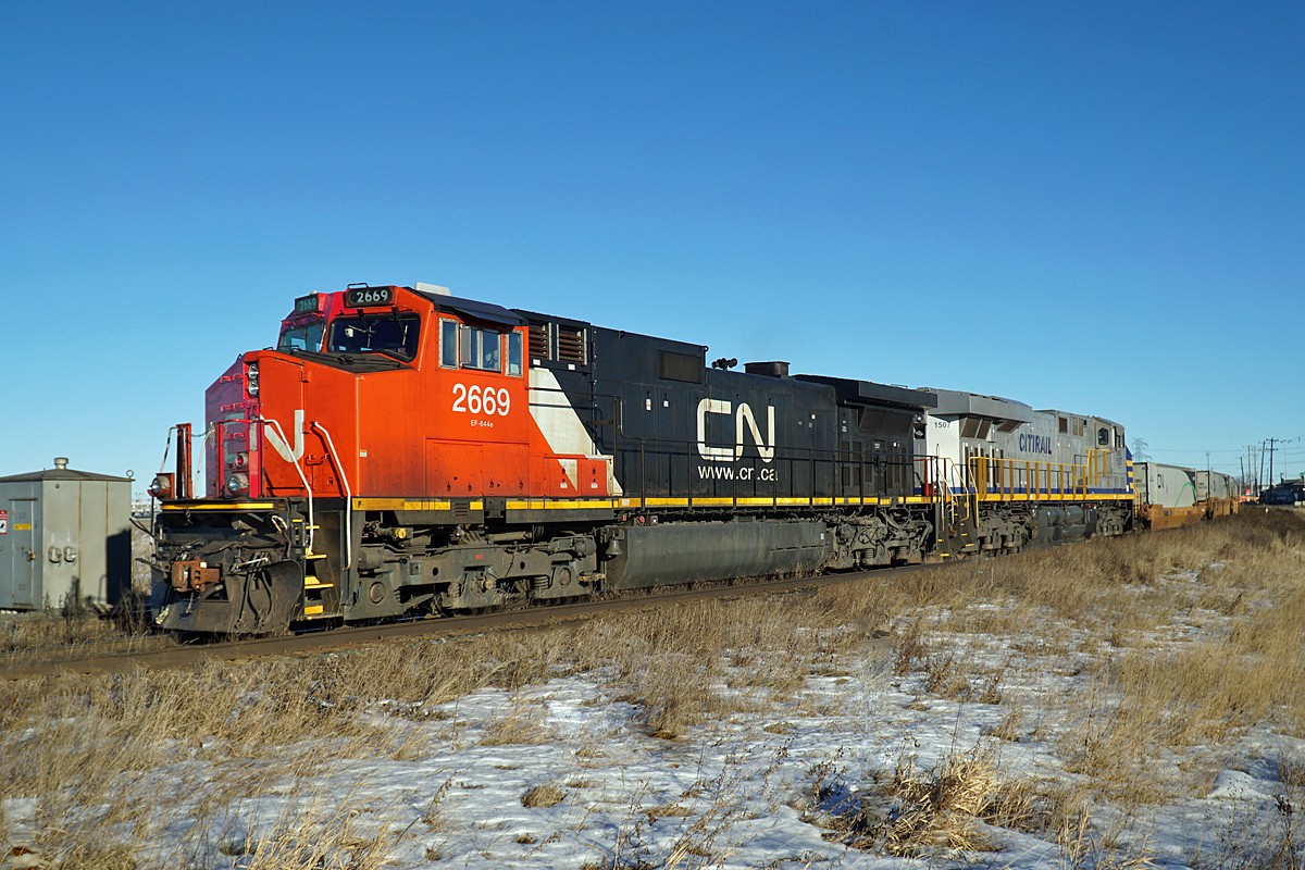 Very rare to see CN using leased power (at least out here in the west) but this train lead by Dash9-44CW, CN 2669 has a  Citicorp ES44AC, CREX 1507 assisting.