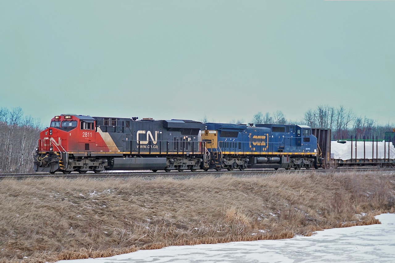 Another nod to current CN power requirements in the west, here ES44AC CN 2811 is assisted by ex CSX C40-9W, now in the GE leasing fleet, GECX 9150.