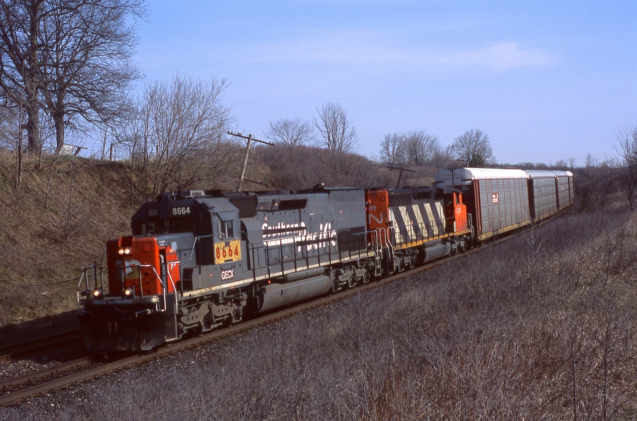Did you know ex-SP tunnel motor's were leading trains in southern Ontario long before GEXR 9392 showed up ?  Well on at least one occasion, CN 271 is seen being lead by SD40T-2 leaser GECX 8664. I'd just shot it trailing on 334 the day before and was shocked to get a phone call the next morning saying it was leading 271 !