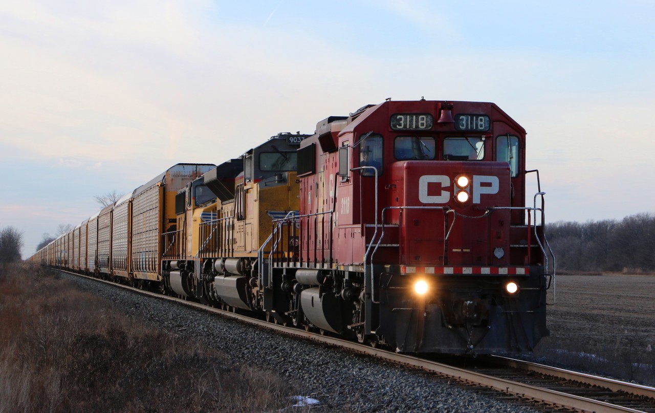 CP 3118 lead's CP 244 east in Puce, Ontario.