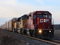CP 3118 lead's CP 244 east in Puce, Ontario.