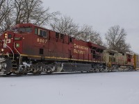 During the season's first major snowfall, CP 141 had a nice surprise in it's consist as BNSF 'warbonnet' 4714 was helping to power behind CP 8807.