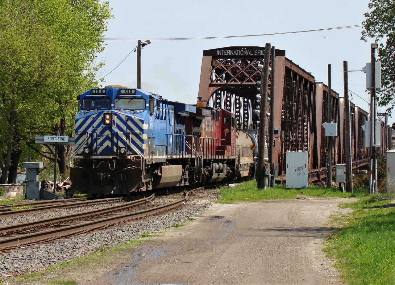 A mixed CP freight heads into Canada crossing The International Bridge at Fort Erie.