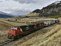 CN nos.2549 & 2557 have reached mile 63.3 on the Okanagan sub and are heading south with today's load of empties.