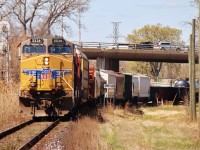 Dipping under the Ouellette Ave. overpass UP 5526 leads a CP GE ahead of a mixed freight out of Windsor Yard and into Lakeshore Jct. on their way east to Walkerville Yard to make a lift, before departing the city.