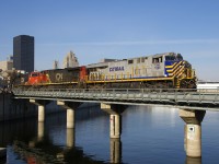 CN 878's light power is leaving the Port of Montreal with CREX 1506 leading IC 2698 and CN 2260 as they cross the canal after leaving most of their train in the port (some of it had been dropped off on track 29 at Turcot West before). CN has found itself power short and has leased approximately 25 CREX ES44AC's, as well, PRLX units (ex-BNSF SD75M's) and GECX units (ex-CSXT Dash8-40CW's) are also already on the property.