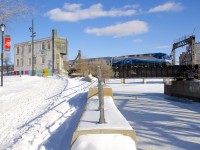 AMT 808 crosses the Lachine Canal a bit south of downtown Montreal on a sunny but frigid day, bound for Mont-St-Hilaire. 