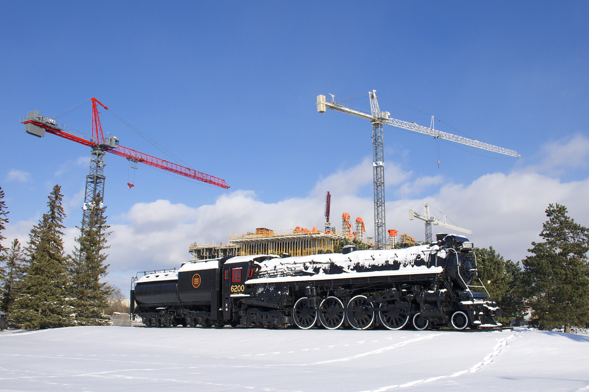 CN 6200 is a 4-8-4 Northern which is preserved on the grounds in front of the Canada Science and Technology Museum, which reopened to the public just a few weeks ago after being closed since 2014. Behind the engine is a new building which I believe will be used by the museum.
