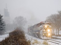 On the morning that Montreal got its first snowstorm of the year, CN 149 is leaving the Port of Montreal wtih BCOL 4626, CN 2648 and CN 2590 for power.