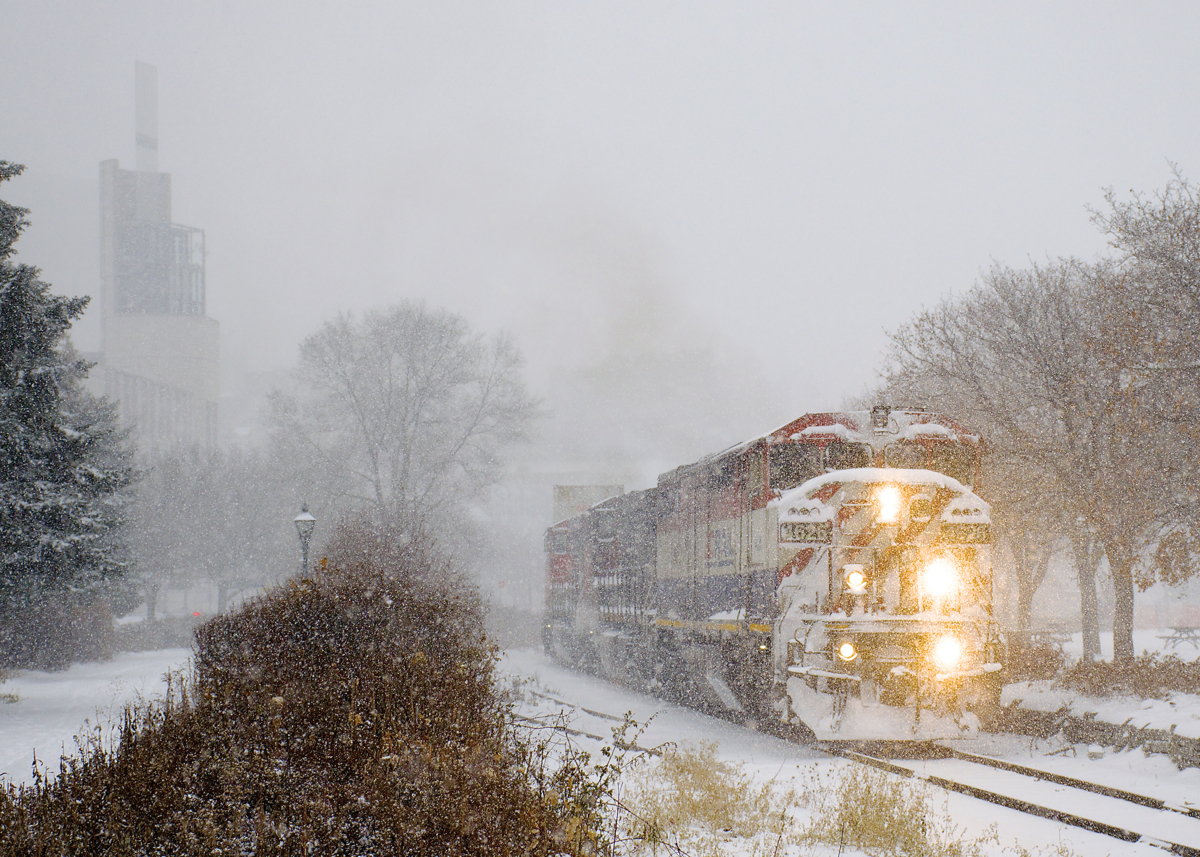 On the morning that Montreal got its first snowstorm of the year, CN 149 is leaving the Port of Montreal wtih BCOL 4626, CN 2648 and CN 2590 for power.