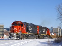 On the last day of the year CN 149 has a pair of SD60's (CN 5420 & CN 5440) as it passes the Turcot Holding Spur at MP 4 of the Montreal Sub. Barely visible above the containers is the skyline of downtown Montreal. 