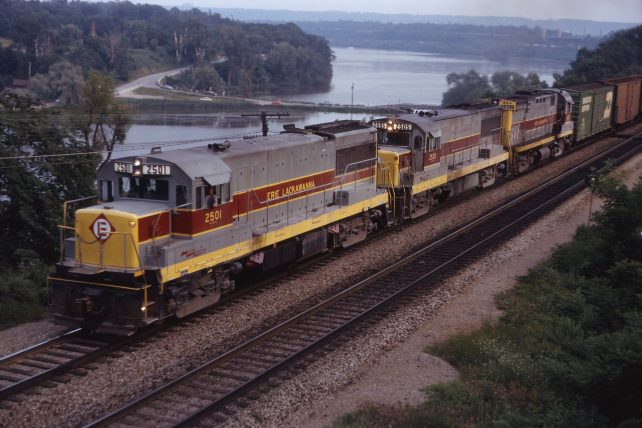 On the fateful day of 27 June 1972 (the day Erie Lackawanna declared bankruptcy), a U25B/U25B/C424 lash-up is in charge of train TC 100 detouring over CN lines. This was one of 30 eastbound and 14 westbound trains that operated over CN between Fort Erie, Ontario and Rouses Point, New York. Interestingly, these trains by-passed Montreal, operating directly between Coteau and Cantic, Quebec over the Valleyfield sub.