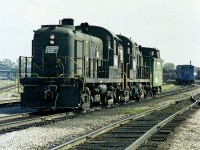 Not the greatest shot by any means, but it IS a pair of Penn Central RS-3s, something I had not seen in Fort Erie before. Don't even recall seeing them in Buffalo.  Anyway, it is a shame it is hard to place this shot, but it is away from the CN diesel shop; you can see CR caboose back there as well and on the left hand side you can make out the Central Av bridge.  It was a quick shot because just as quickly I was going to get myself ushered out of the area. Just could not resist this power.............. Units are 5462 and 5329.