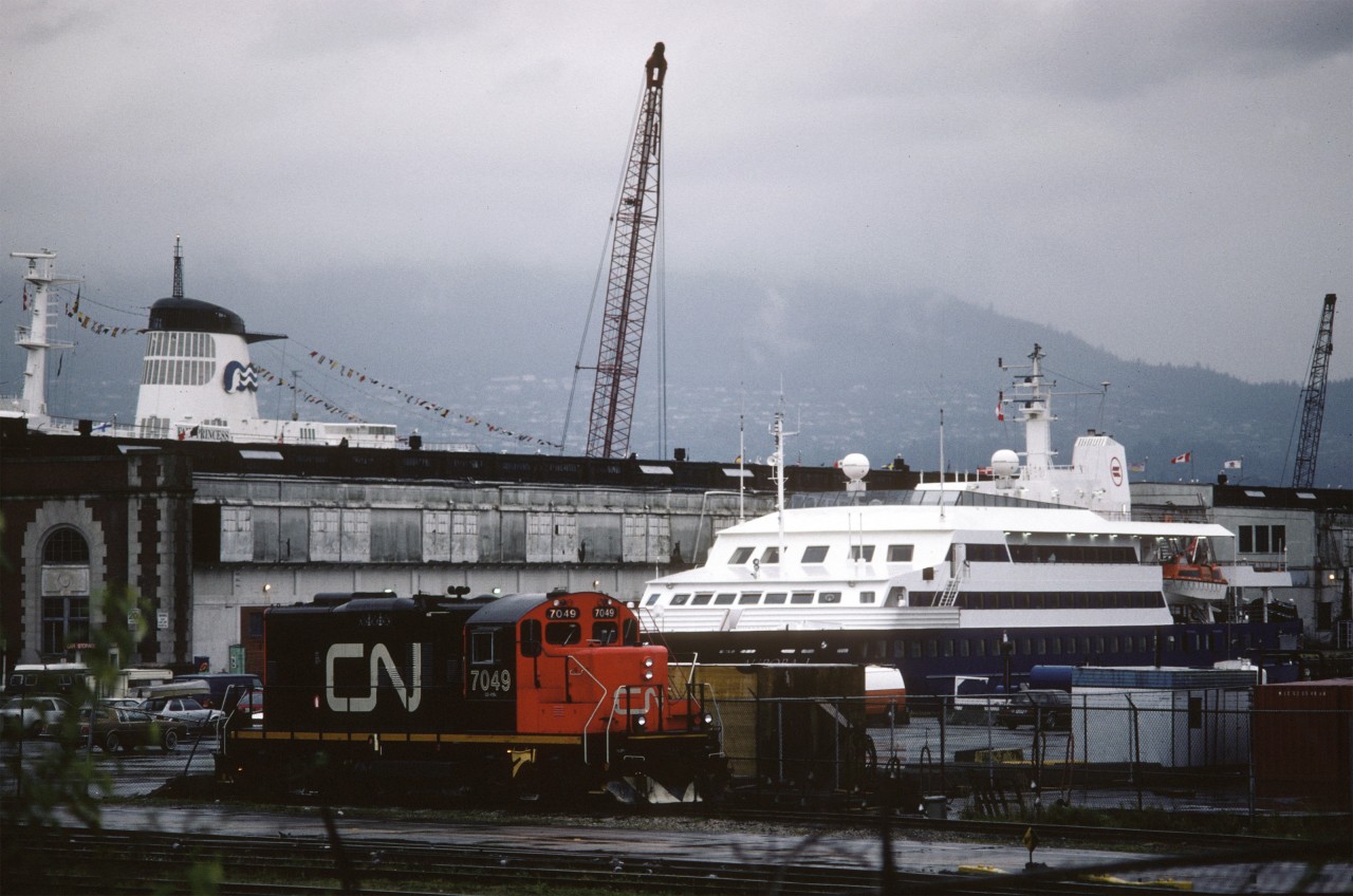 CN#7049 EMD GP9RM on a rainy day, Vancouver Port 1991