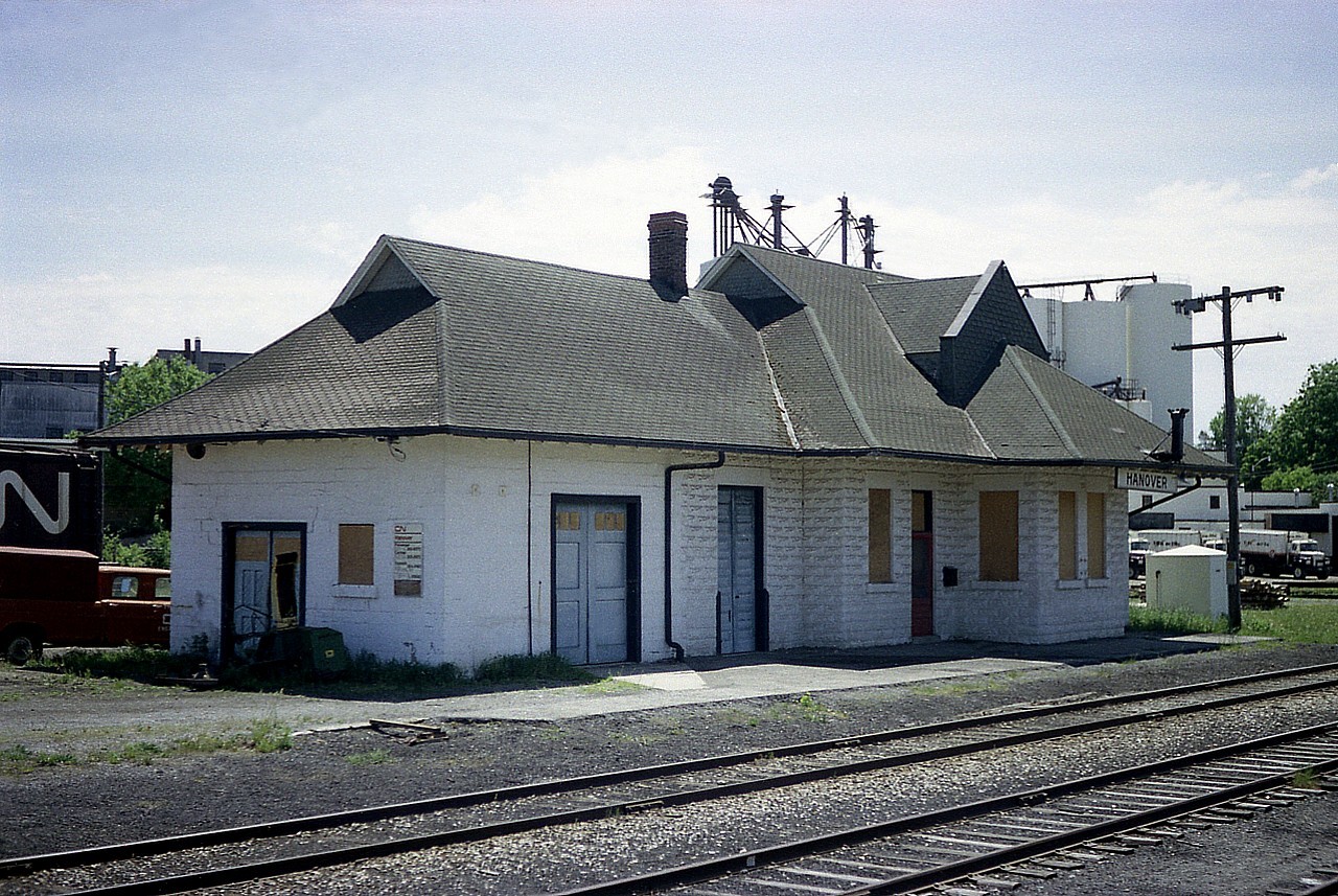 The old Hanover CN station was a solidly built structure. It dates back into the 1900s. However, it fell into disuse as the traffic on the line dwindled down and closed some years before I shot this image in 1977. It lived on as a depot for various things, inc the Boy Scout bottle Drive depot and then Municipal storage. I believe it is gone now. The track was lifted in the mid 90s.
