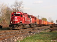 A westbound CP train led by SOO SD60 6048 and a CP SD40-2 is viewed passing the Orrs Lake, Ontario siding on the CP Galt Subdivision on October 29, 2007. 