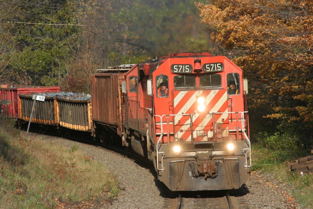 “The Pick-Up” or train T69, as was its official symbol, is seen passing Mile 59 on CP’s Galt Subdivision as it grinds up legendary Orrs Lake hill behind a pair of SD40-2’s still proudly adorning their multi-mark’s  on October 29, 2007.