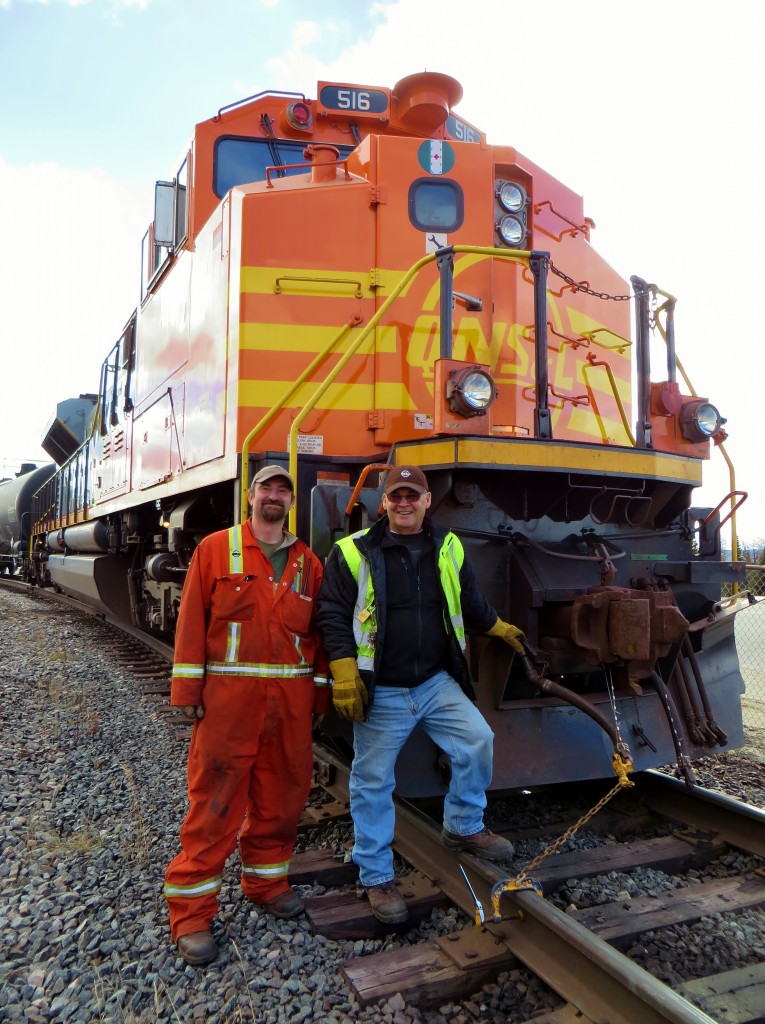 LABRADOR LINESMEN. Following an early morning return run from to Emeril Junction to perform some switching and pick up cars that were dropped by a Northbound train from Sept-Iles the night before, QNS&L #516 and her consist are secured in the yard at Labrador City by the crew. Seasoned Engineman Joseph Hynes was accompanied on this particular run by the then Junior Engineman Chris Pike, both of whom are true professionals in every sense of the word, as well as being the epitome real railway men. For Joe and Chris, railroading is not simply just a career but rather a way of life. As for the nearly mint 516, the SD70ACe built in December of 2012 by EMDC along with sisters 514, 515, and 517, was ready to commence her third winter in the sometimes harsh and rugged northern climate of Labrador.